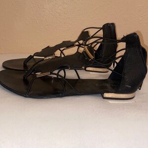 Black and gold sandals